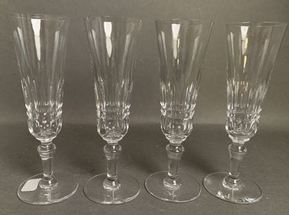 BACCARAT Four cut-crystal champagne flutes,...