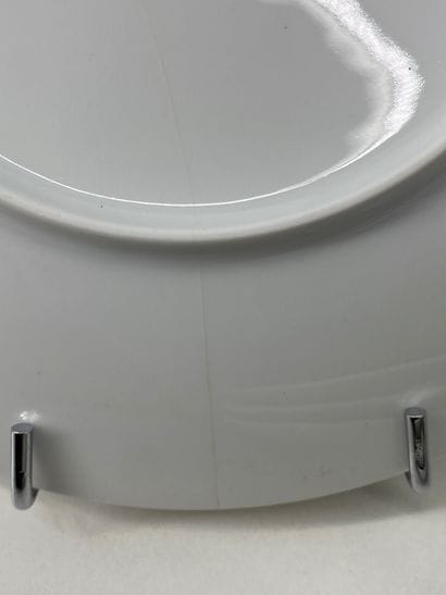 LE CHAMBRELAIN Suite of six large white porcelain...