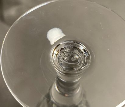 BACCARAT Four cut-crystal champagne flutes,...