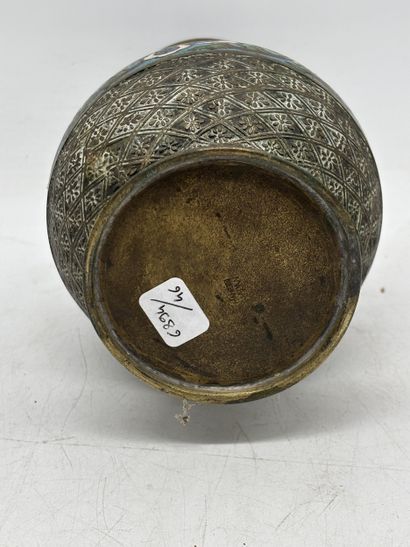 Patinated bronze baluster vase with two lion...