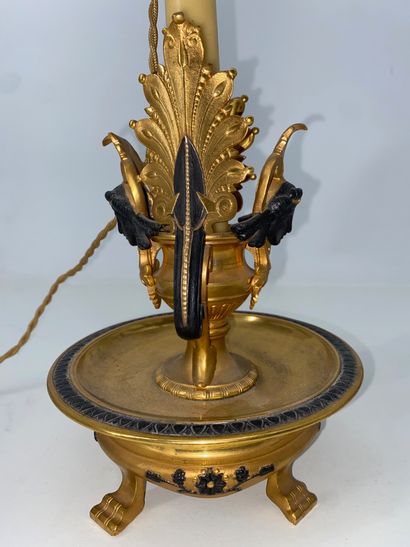 Gilt bronze and brown patina bronze candlestick,...