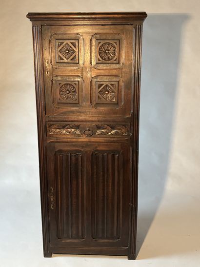 Standing man in natural wood carved with...