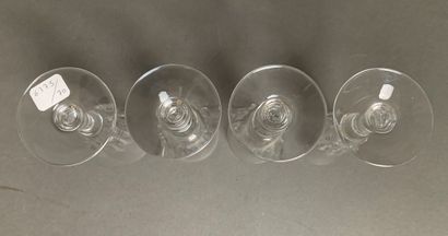 BACCARAT Four cut-crystal champagne flutes,...