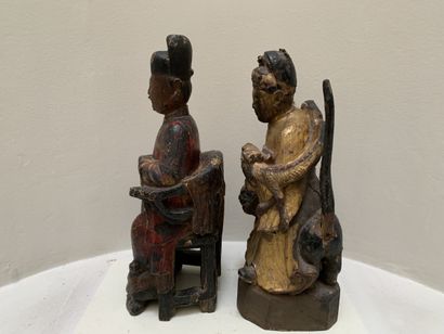 Deux sculptures en bois polychrome et doré...