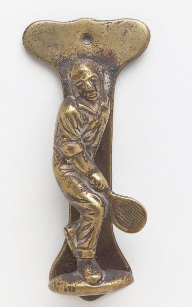 heurtoir de porte représentant un tennisman...