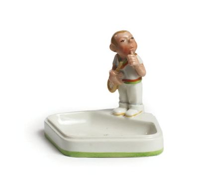 vide-poche en porcelaine polychrome surmonté...
