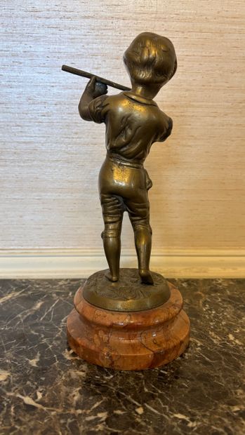 Modern school
Child playing the flute
Bronze...