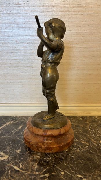 Modern school
Child playing the flute
Bronze...