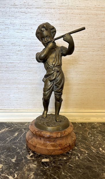 Modern school
Child playing the flute
Bronze...