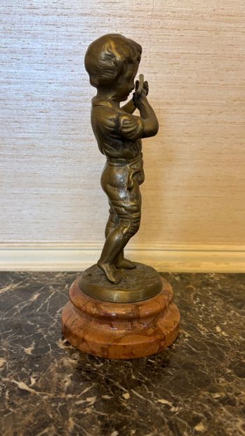 Modern school
Child playing the flute
Bronze...