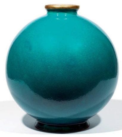 LONGWY
Vase boule coloniale en faïence émaillée...