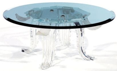 Table circulaire en verre, le piétement composé...