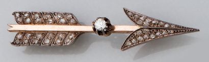 Broche flèche en or et argent, sertie de...
