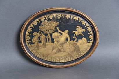 Oval cardboard panel with an engraved design...