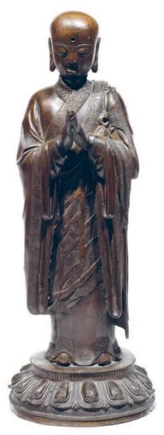 Sujet en bronze à patine brune représentant...