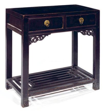 Console ouvrant à deux tiroirs en bois laqué....