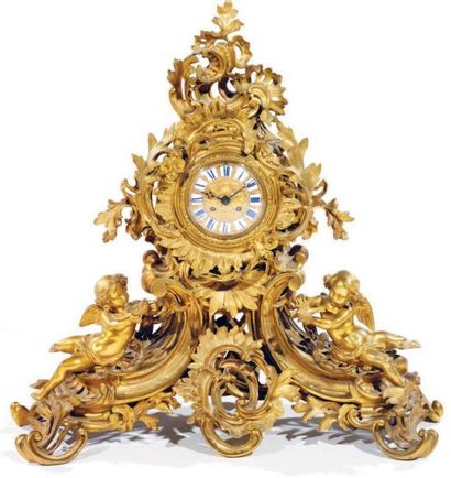 Importante pendule en bronze doré à décor...