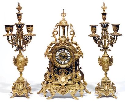 Importante garniture de cheminée en bronze...