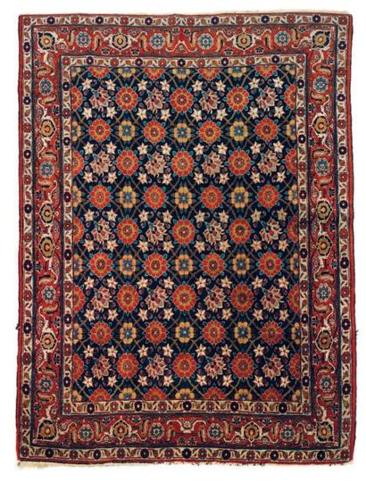 Tapis veramine à décor floral polychrome...