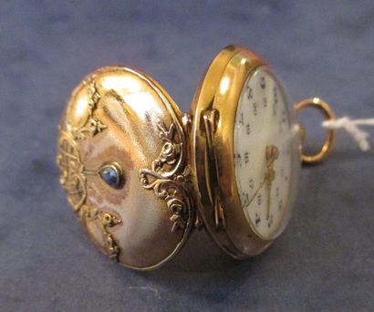 Montre de col en or 18K et pierre bleue,...