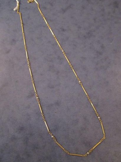 Chaine de cou en or jaune 18 k et perles,pds...