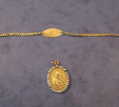 Lot en or jaune 18 k: gourmette gravée Marie...