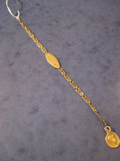 Gourmette en or jaune 18 k gravée Henriette...