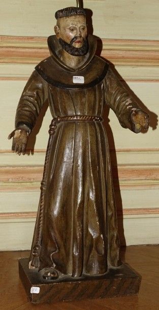 Statuette en bois sculpté et laqué au naturel...