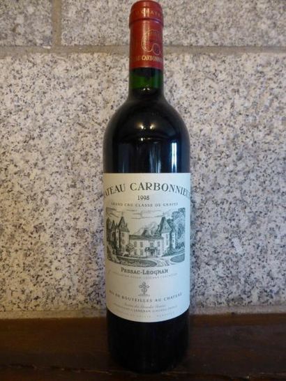 4 bouteilles CH. CARBONNIEUX, Pessac-Léognan...
