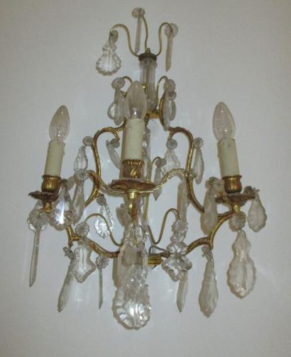 Paire d'appliques en bronze et pampilles

H...