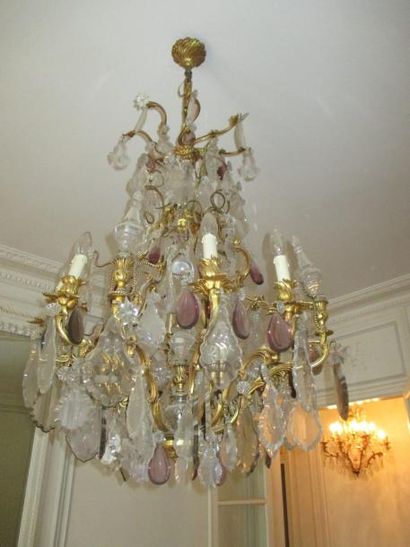 Lustre en bronze et pampilles à douze bras...