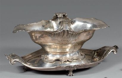 Saucière ovale à plateau adhérant en argent,...