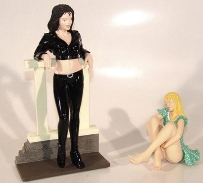 MANARA
Ensemble de 2 statuettes en résine...