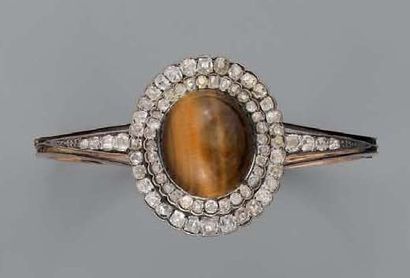 BRACELET RIGIDE ouvrant en or jaune et argent,...