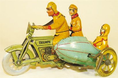 Moto side car TRIUMPH en tôle lithographiée...