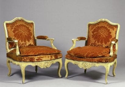 Paire de fauteuils à dossier plat en bois...