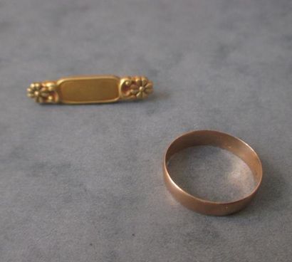 Lot en or jaune 18k : une broche de naissance...