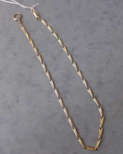 Une chaîne de montre en or jaune 18 k, 18,4...