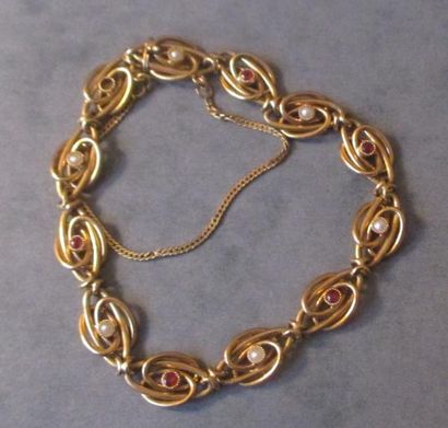 Bracelet en or jaune 18k à maillons ajourés...