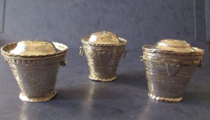 Trois étuis couverts en argent travail oriental...