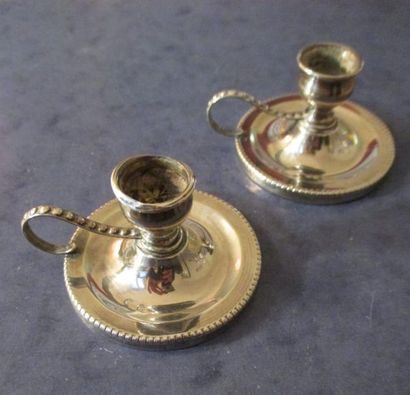 Paire de petits bougeoirs à main en argent,...