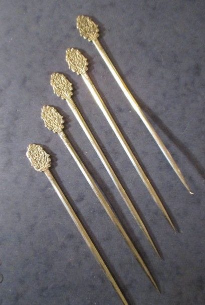 Cinq brochettes en argent, pds : 100 g.