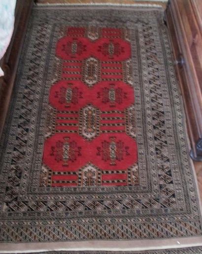 Petit tapis à fond orange 180x120
