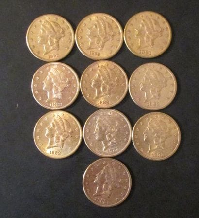 Dix pièces de 20 dollars en or 1883(6),1888(3),...