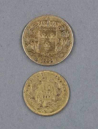 Une pièce de 20 FF en or Louis XVIII tête...