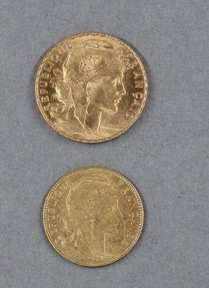 Une pièce de 20 FF et une pièce de 10 FF...