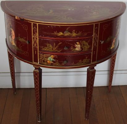 Petite commode demi lune en bois laqué rouge...