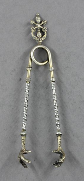 Petite pince à sucre en argent et vermeil,...