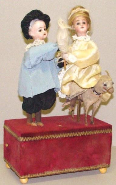Automate sur socle figurant un meunier et...