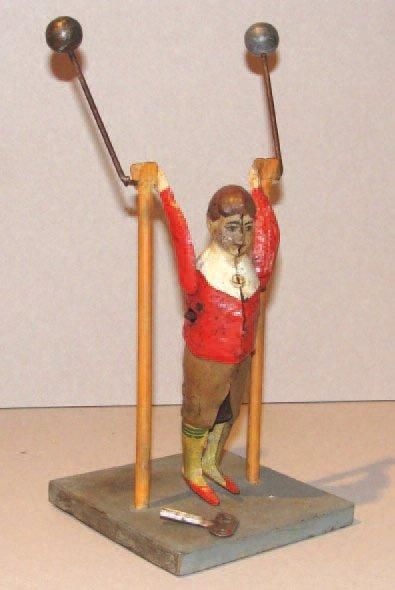 Jouet mécanique allemand figurant un acrobate...